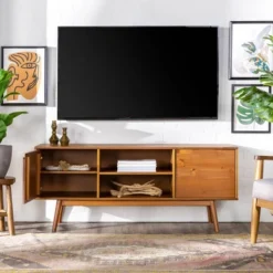 Solid Wood Mid-Century Modern TV Stand For TVs Up To 65" - Saracina Home 24 Solid Wood Mid-Century Modern TV Stand For TVs Up To 65" - Saracina Home -Baxton Studio Shop GUEST 334bf308 b086 4c05 9568 1ae4a156a658