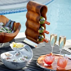 Nambe Handcrafted Acacia Wood Curvo Winery Rack With Alloy Metal Base Modern Design, Holds 4 Bottles, Brown Silver -Baxton Studio Shop GUEST 41722bfd 26f6 43f8 bec3 828b56ab3658