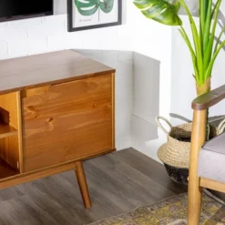 Solid Wood Mid-Century Modern TV Stand For TVs Up To 65" - Saracina Home 17 Solid Wood Mid-Century Modern TV Stand For TVs Up To 65" - Saracina Home -Baxton Studio Shop GUEST 64291693 f8bf 4214 8739 2fe9a7cbadf0