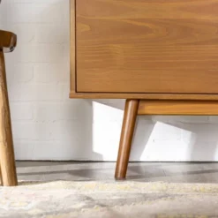 Solid Wood Mid-Century Modern TV Stand For TVs Up To 65" - Saracina Home 20 Solid Wood Mid-Century Modern TV Stand For TVs Up To 65" - Saracina Home -Baxton Studio Shop GUEST cda6b074 d568 4d66 b464 601370e6db11