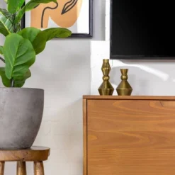 Solid Wood Mid-Century Modern TV Stand For TVs Up To 65" - Saracina Home 18 Solid Wood Mid-Century Modern TV Stand For TVs Up To 65" - Saracina Home -Baxton Studio Shop GUEST faab6dec 2110 4cdc b95e 363b96218060